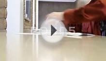 Woman Mailing Letter At Post Office